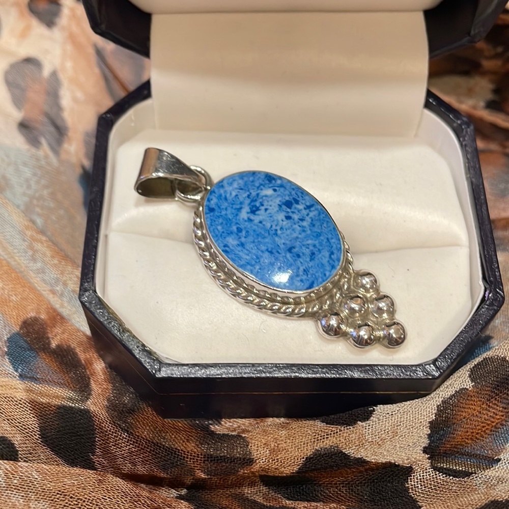 Beautiful sterling silver with denim stone pendant